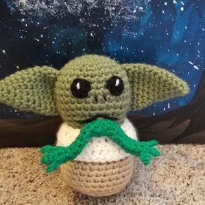 Baby Yoda ate a 🐸! Hand crocheted